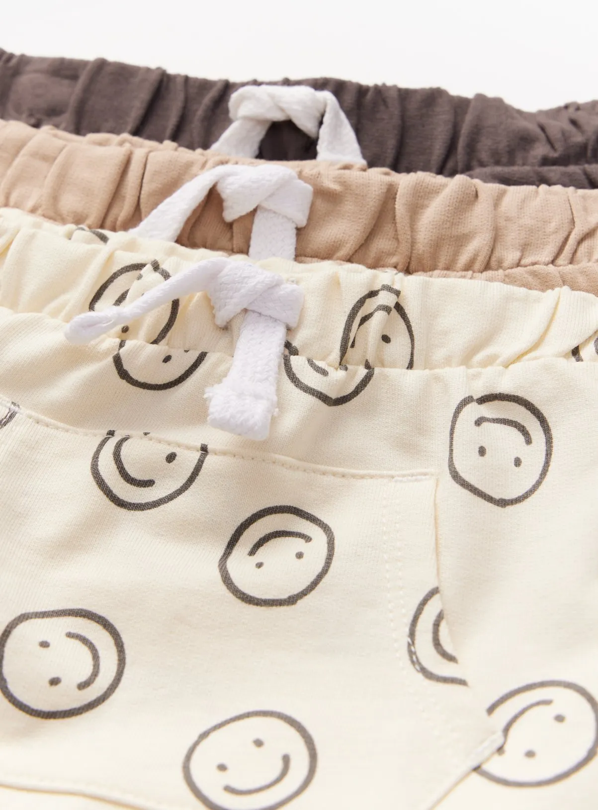 Buy Neutral Smiley Face Print Jersey Shorts 3 Pack  Up to 3 mths | Outfits and sets | Tu